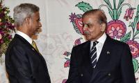 Jaishankar, Pak PM Sharif shake hands at SCO dinner