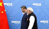 Must find 'right path' to live in harmony: Xi to Modi