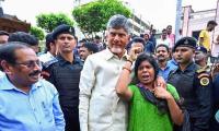 Naidu Uses A JCB To Meet Flood Affected