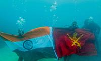 Hoisting The Tiranga Underwater