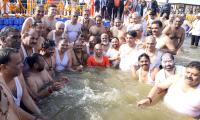 Yogi holds cabinet meet at Maha Kumbh, takes holy dip 