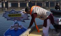 BJP leader immerses Kejriwal's effigy in Yamuna  