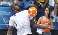 'Sprint King' Bolt signs for a football team