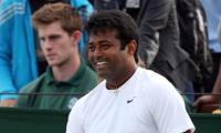 Paes-Hingis race into mixed doubles quarters