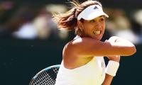 Spanish finalist Muguruza growing to love grass