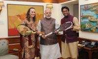 Paes, Hingis present PM Modi with autographed racquets