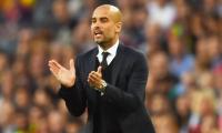 Barca's Pique likens Guardiola to Ferguson