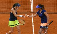 Saina, Paes, Bopanna advance in doubles at French Open