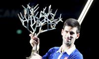 Impressive Djokovic makes history with Paris title