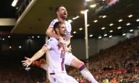 EPL PHOTOS: Palace lord over Liverpool; Spurs hold Arsenal in derby