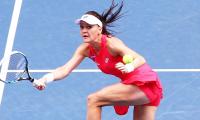 With Tianjin title in bag, Radwanska books WTA Finals place