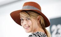 Sharapova delights on return from layoff