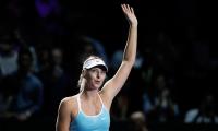 WTA Finals PHOTOS: Spotless Sharapova carries Radwanska into semis