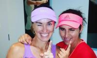 Sania-Hingis advance into last four of WTA Finals