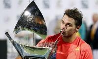 Dubai title: Wawrinka wins after marathon tiebreak