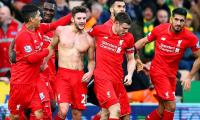 EPL PIX: Liverpool sink Norwich; Leicester fairytale continues