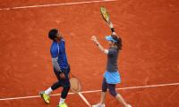 Paes-Hingis rally to win their first French Open mixed doubles title