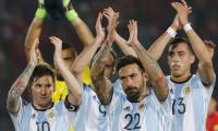 Argentina fight back for 2-1 win on Messi return