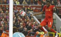 EPL PIX: Benteke salvages point for Liverpool; Norwich go down