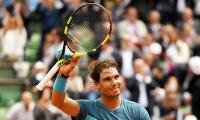 French Open PIX: Nadal, Djokovic, Serena march on; Bouchard ousted