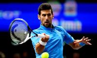 PHOTOS: Djokovic, Murray win as battle for No. 1 spot hots up