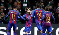 PHOTOS: Messi double lifts Barcelona, Man City advance