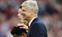 Arsenal snatch last-gasp win for Wenger's 20th anniversary