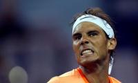 Nadal stunned, Murray cruises in Shanghai