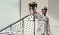 Hamilton takes 50th win at United States GP to stay in title race