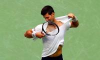 Djokovic solves Monfils puzzle to reach US Open final