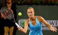 Gutsy Mladenovic ends Sharapova comeback at Stuttgart