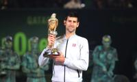 PHOTOS: Djokovic downs Murray to win Qatar crown 