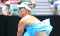 Kerber says top ranking weighs, but ready for grass season