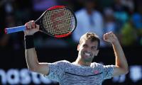 Dimitrov buries Goffin in baseline battle to book semis spot