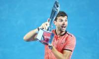 Dimitrov stuns Nishikori to end trophy drought with Brisbane title