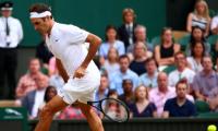 Federer subdues old-school Zverev to reach Wimbledon last 16