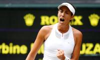 Muguruza crushes Rybarikova to storm into Wimbledon final