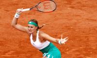  'Kiki' Mladenovic feeds off home crowd to advance in Paris