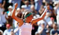 Unseeded Ostapenko stuns Halep to win French Open crown