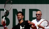 McEnroe urges Agassi to spend more time with Djokovic