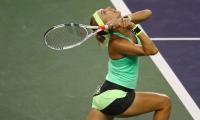 PHOTOS: Vesnina ousts Venus, Mladenovic beats Wozniacki