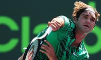 Miami Open: Federer in, Wawrinka out on mixed day for Swiss