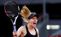 'Motivated' Bouchard claims victory over Sharapova in thriller