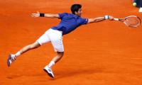 Djokovic, Nadal battle through at Madrid Open