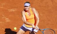 Sharapova advances in Rome, but will she make Wimbledon main draw?