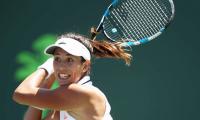 Italian Open: Muguruza survives day of shocks, Kerber out