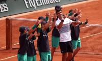 Djokovic makes winning French Open start on Agassi's watch