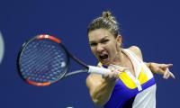 Top-ranked Halep hoping to keep dream alive at WTA Finals