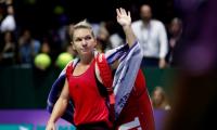 Halep shakes off disappointment of latest Singapore flop