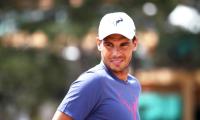 Nadal returns to favourite hunting ground on red soil